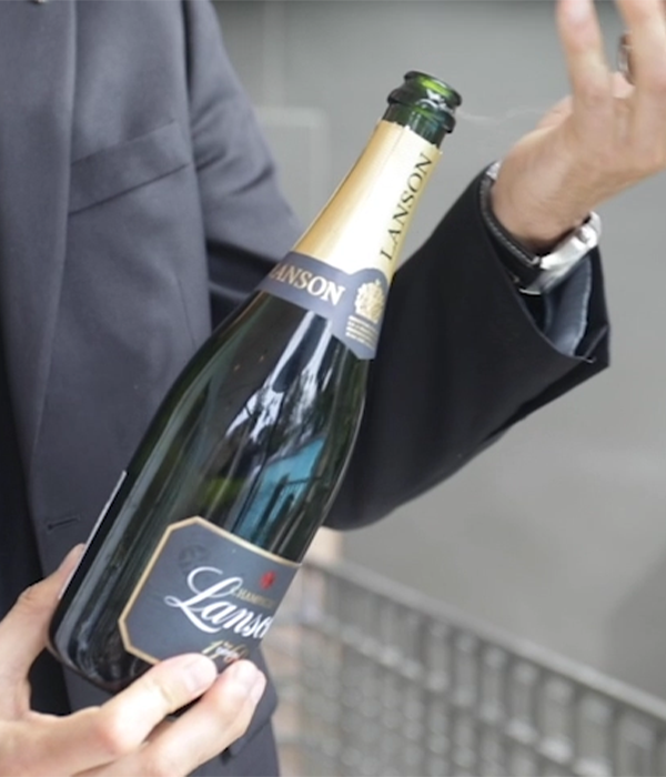 opening lanson champagne bottle